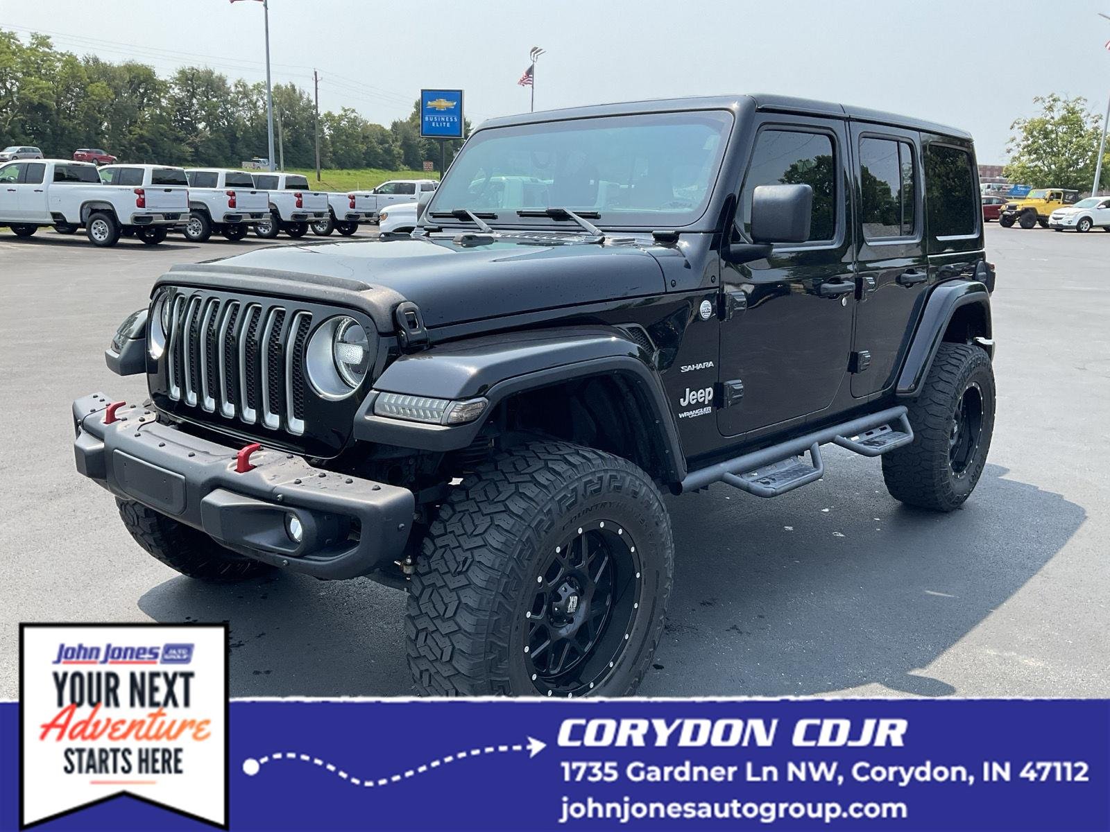 Used 2018 Black Clearcoat Jeep Sahara image 1