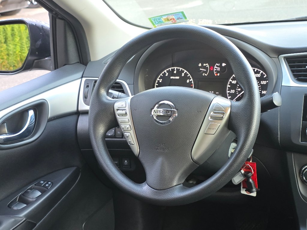 Used 2016 Super Black Nissan S image 21