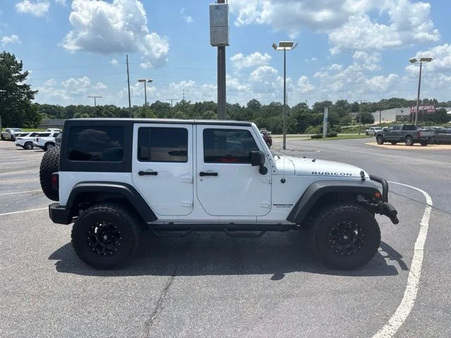 Used 2014 Jeep Wrangler Unlimited Rubicon with VIN 1C4BJWFG6EL150598 for sale in Tuscaloosa, AL