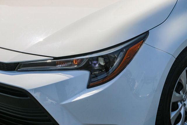 Used 2024 White Toyota LE image 6