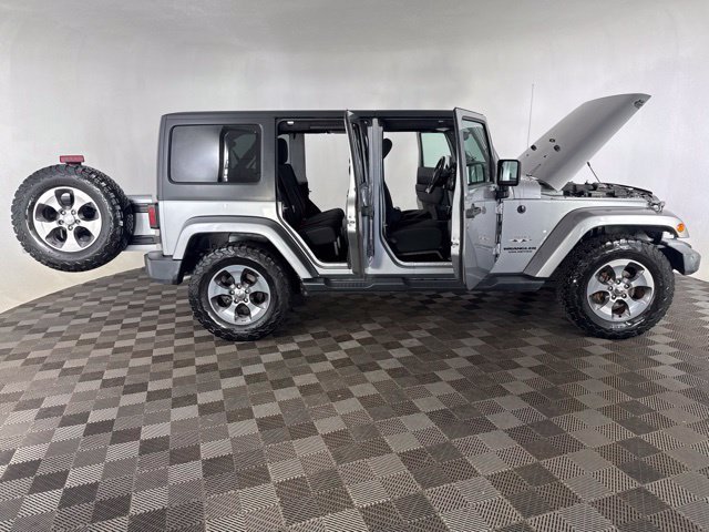 Used 2016 Silver Jeep Unlimited Sahara image 18