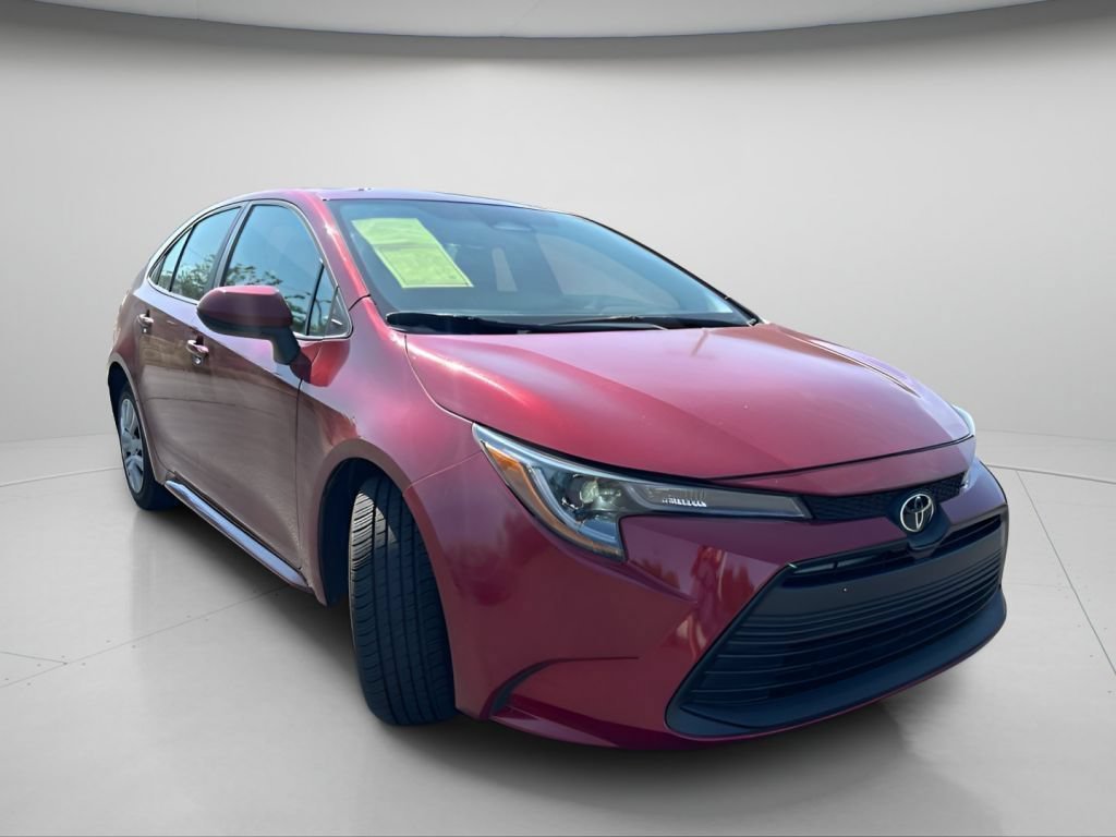 Used 2024 Pearl Toyota LE image 2