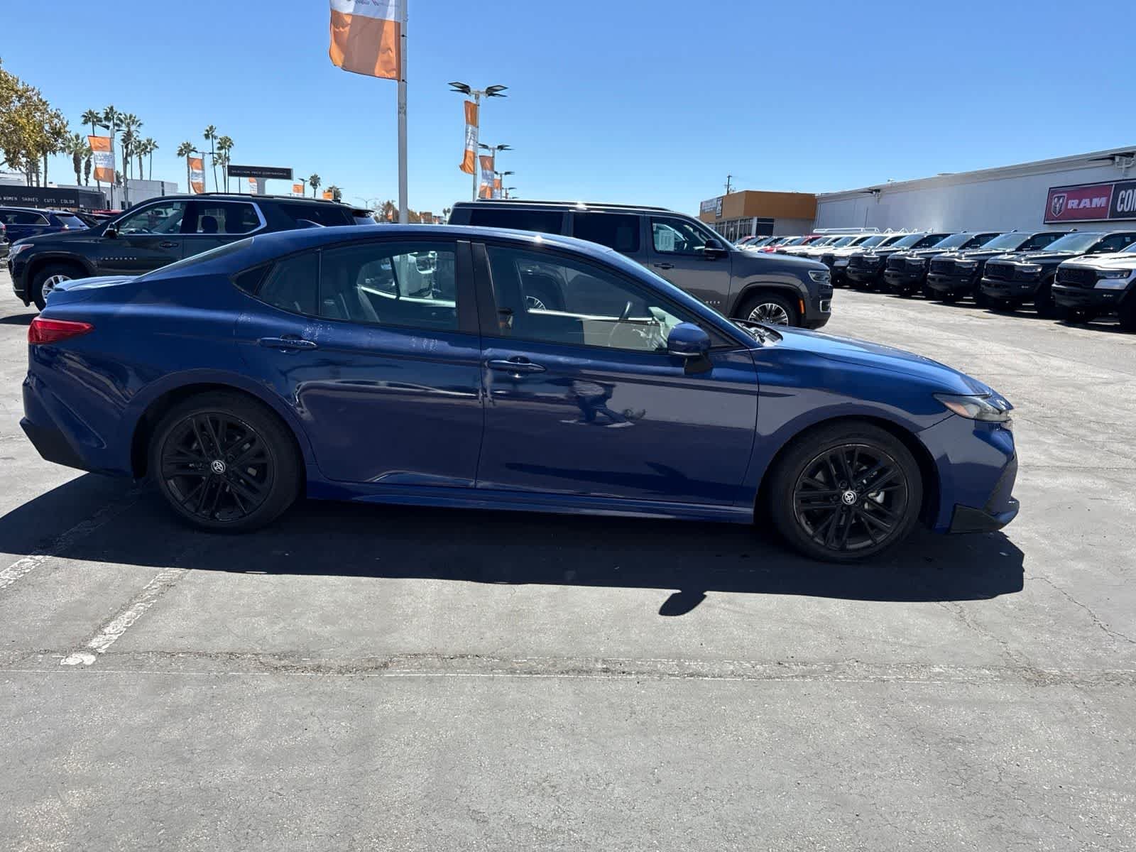 Used 2025 Reservoir Blue Toyota SE image 12