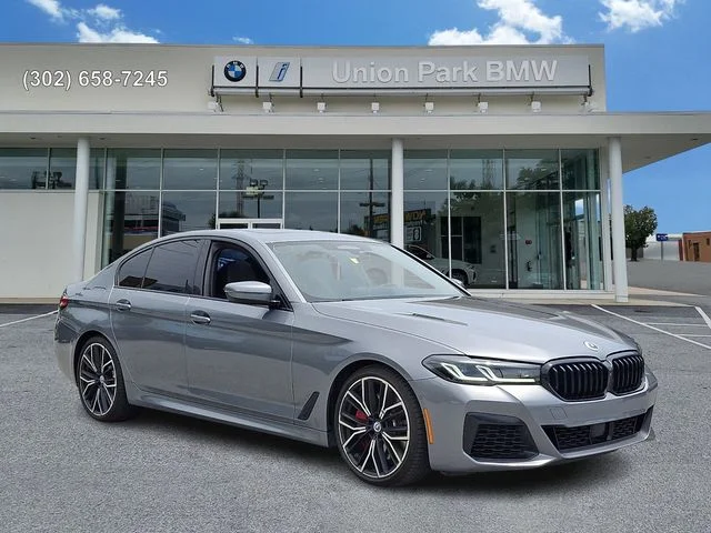 Used 2023 Skyscraper Grey Metallic BMW M550i xDrive image 3