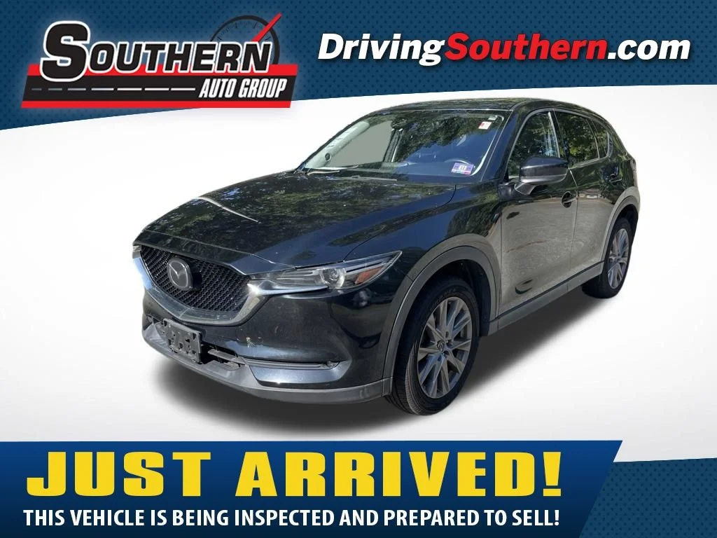 Used 2019 Black Mazda Grand Touring image 1