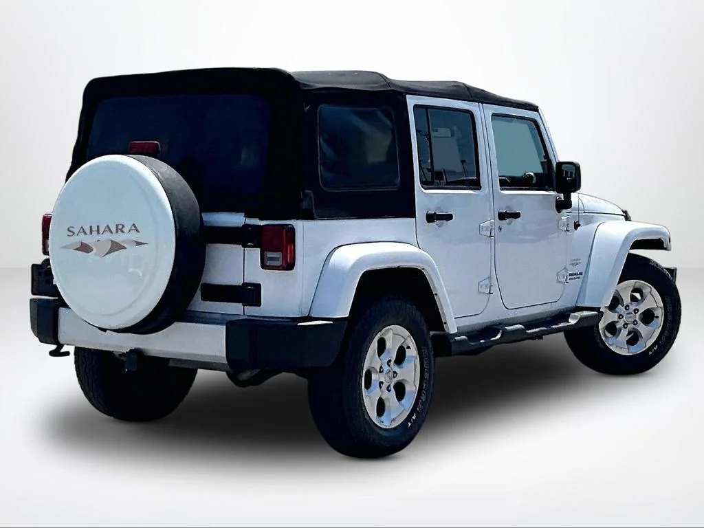 Used 2015 White Jeep Unlimited Sahara image 3