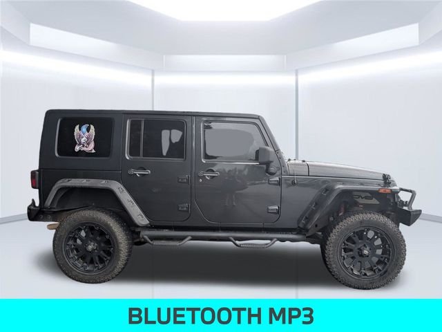 Used 2010 Jeep Wrangler Unlimited Sport with VIN 1J4BA3H13AL139733 for sale in Milton, FL