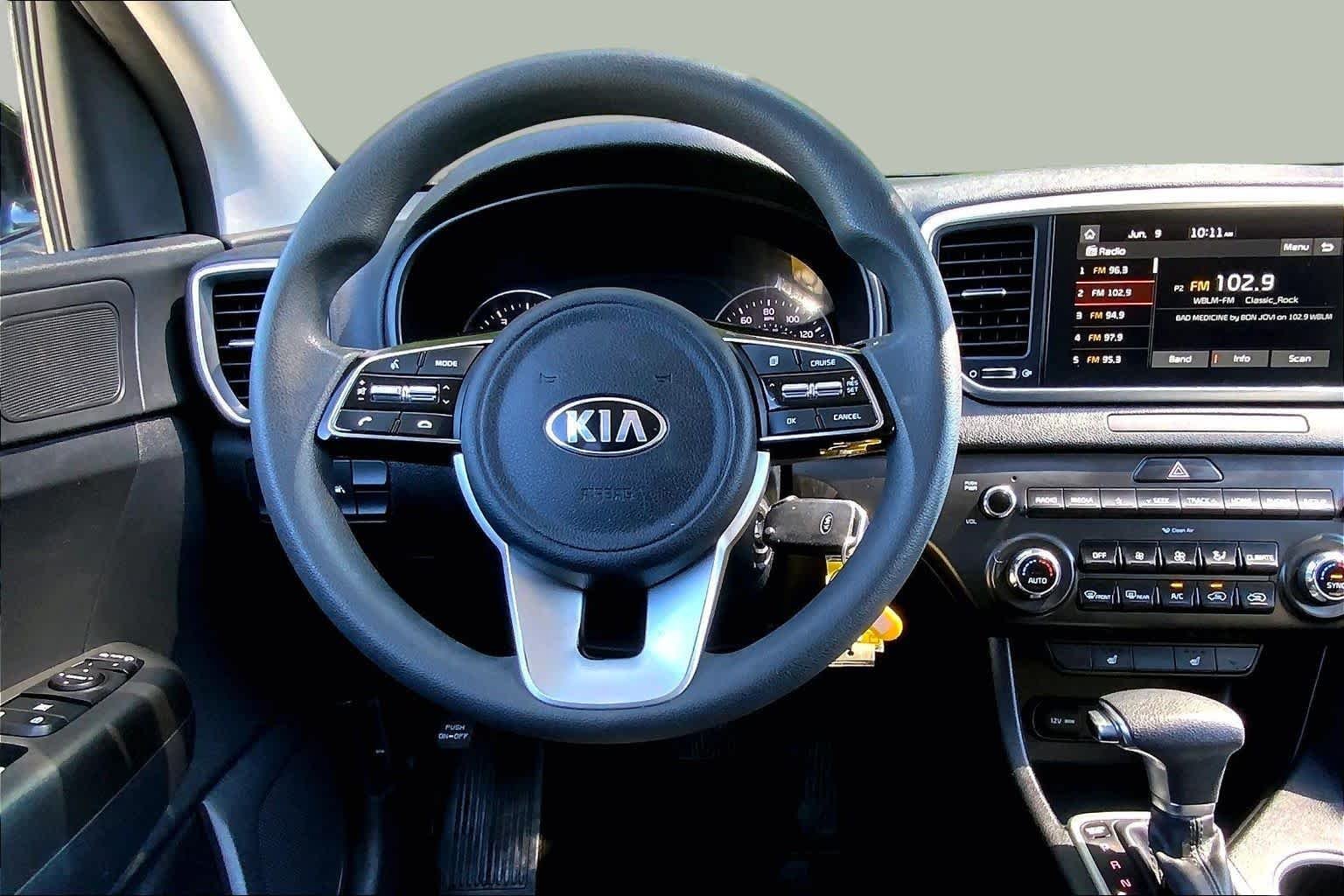 Used 2021 Black Cherry Kia LX image 6