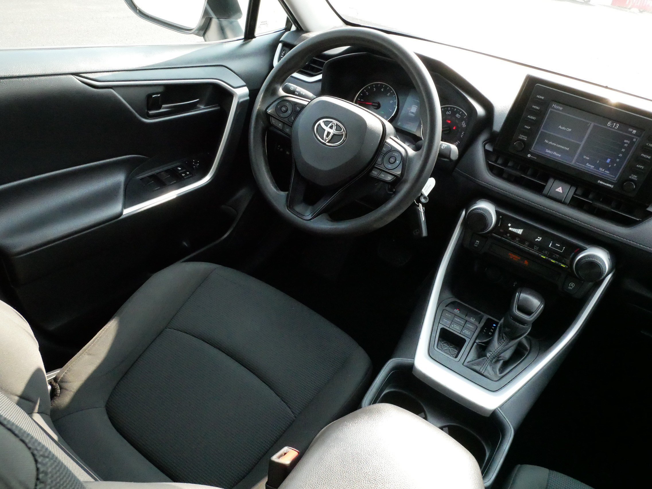 Used 2021 Super White Toyota LE image 9