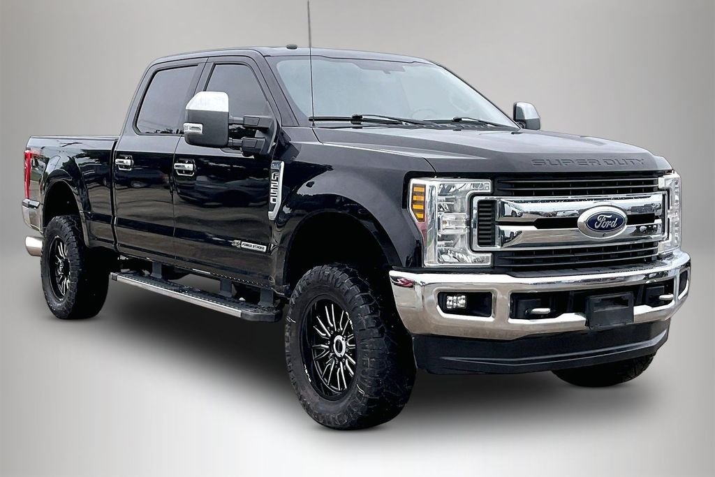 Used 2019 Agate Black Metallic Ford XLT image 1