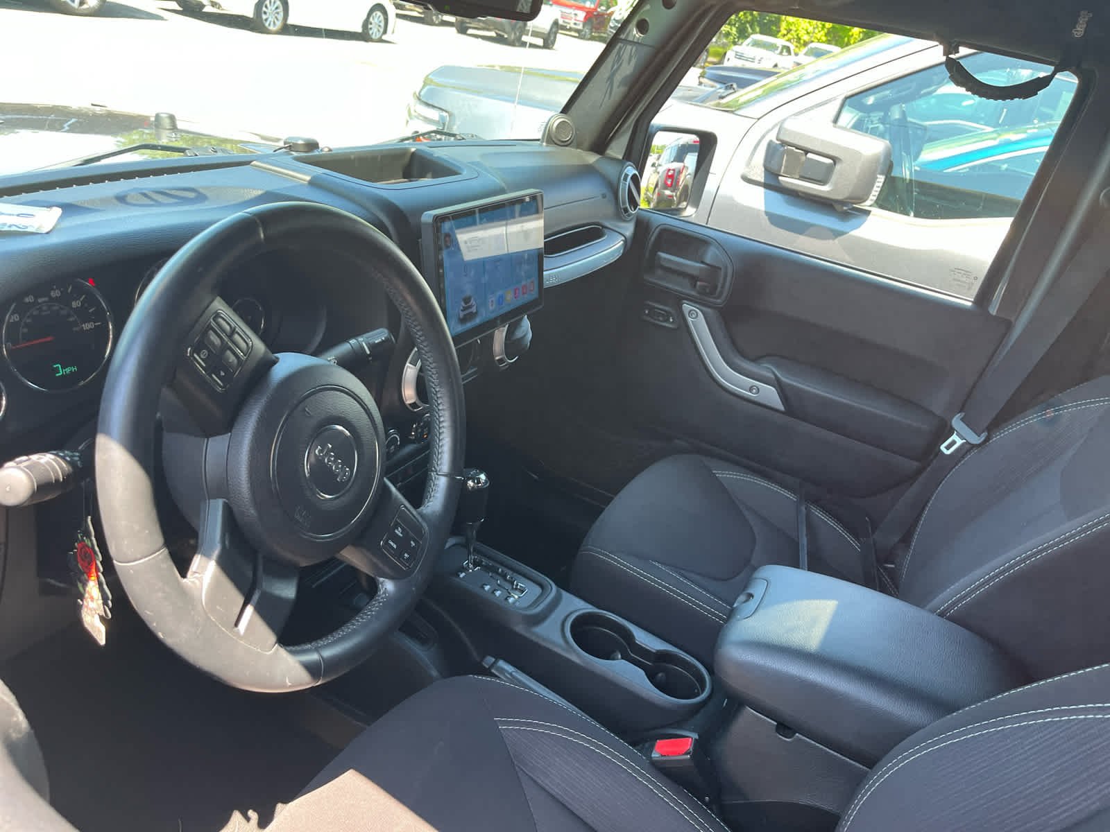 Used 2014 Granite Crystal Metallic Clearcoat Jeep Sahara image 4