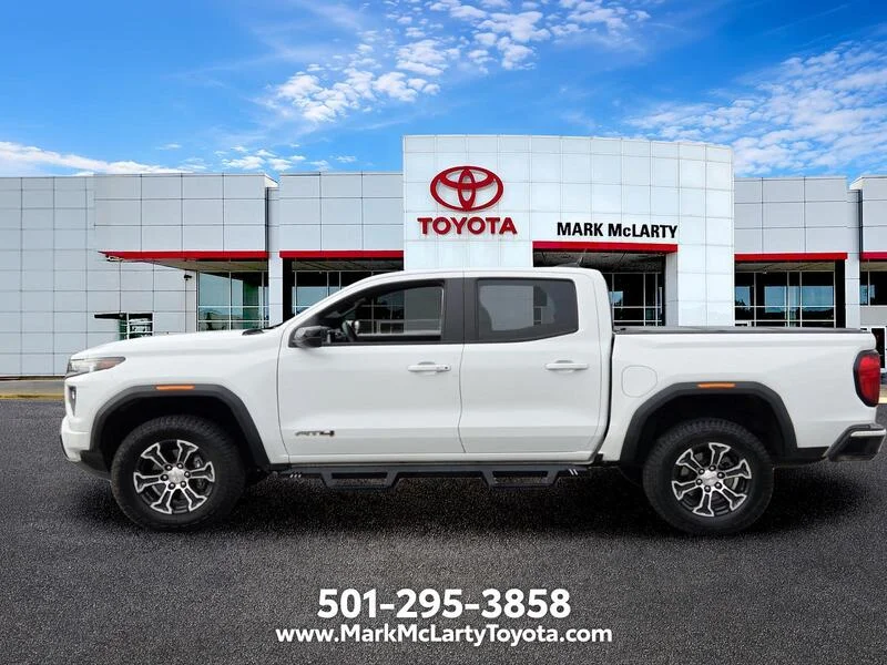 Used 2023 Summit White GMC 4WD Crew Cab AT4 image 2