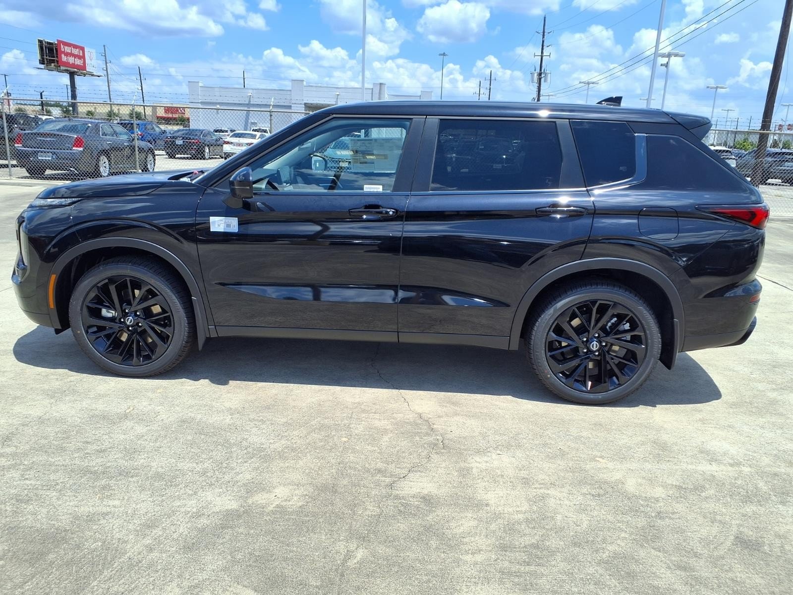 2026 Nissan Rogue Plug-In Hybrid SL Black at Sterling McCall Nissan