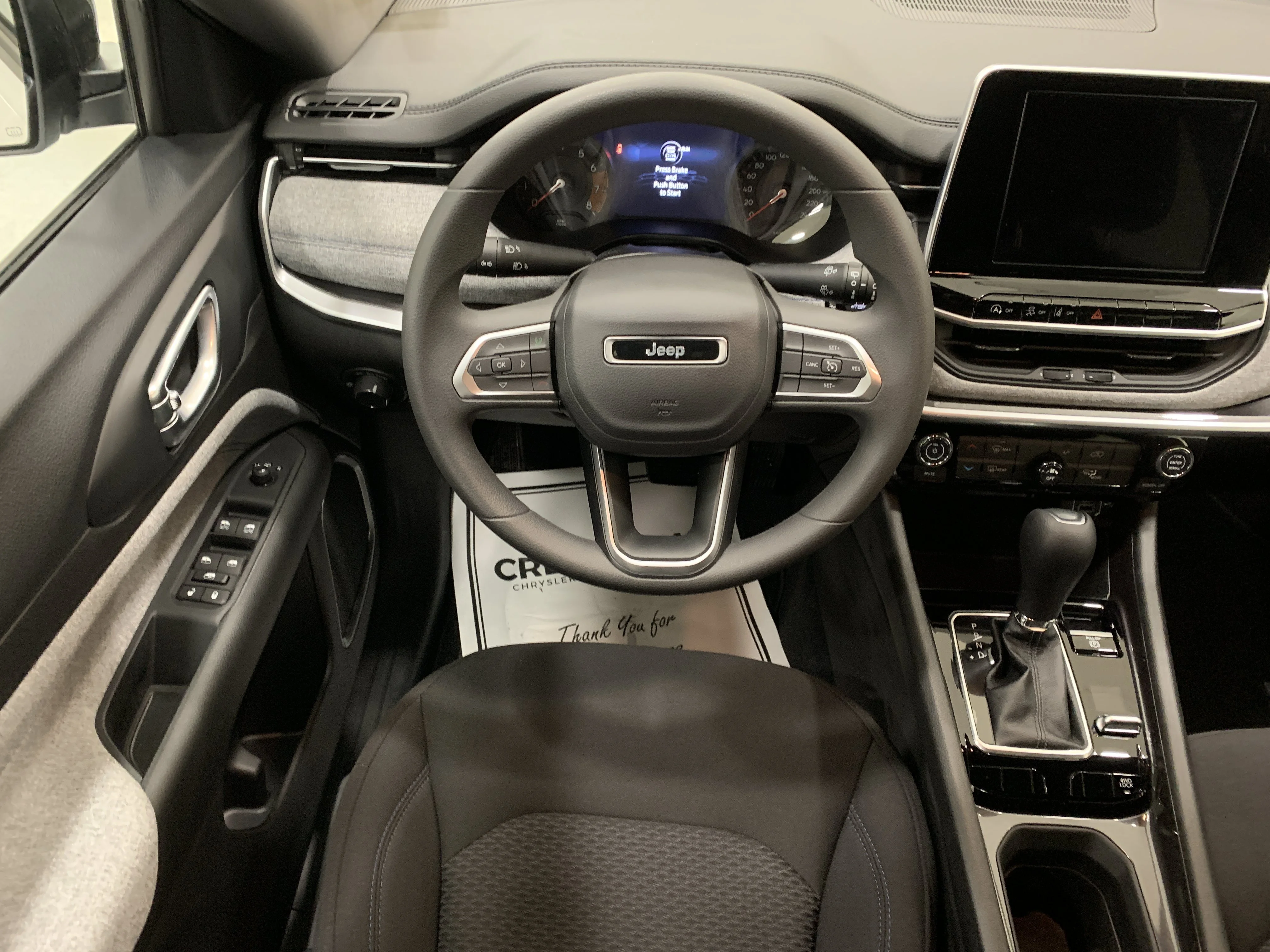New 2026 Bright White Jeep Sport image 11
