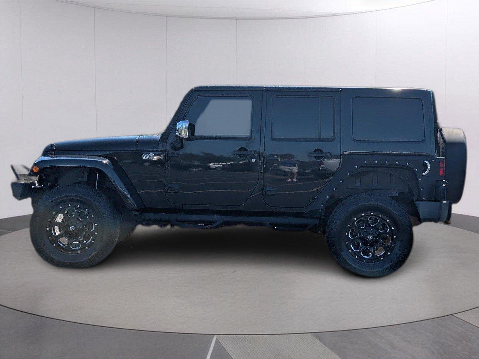 Used 2012 Jeep Wrangler Unlimited Altitude with VIN 1C4BJWEG9CL255179 for sale in Columbia, MS