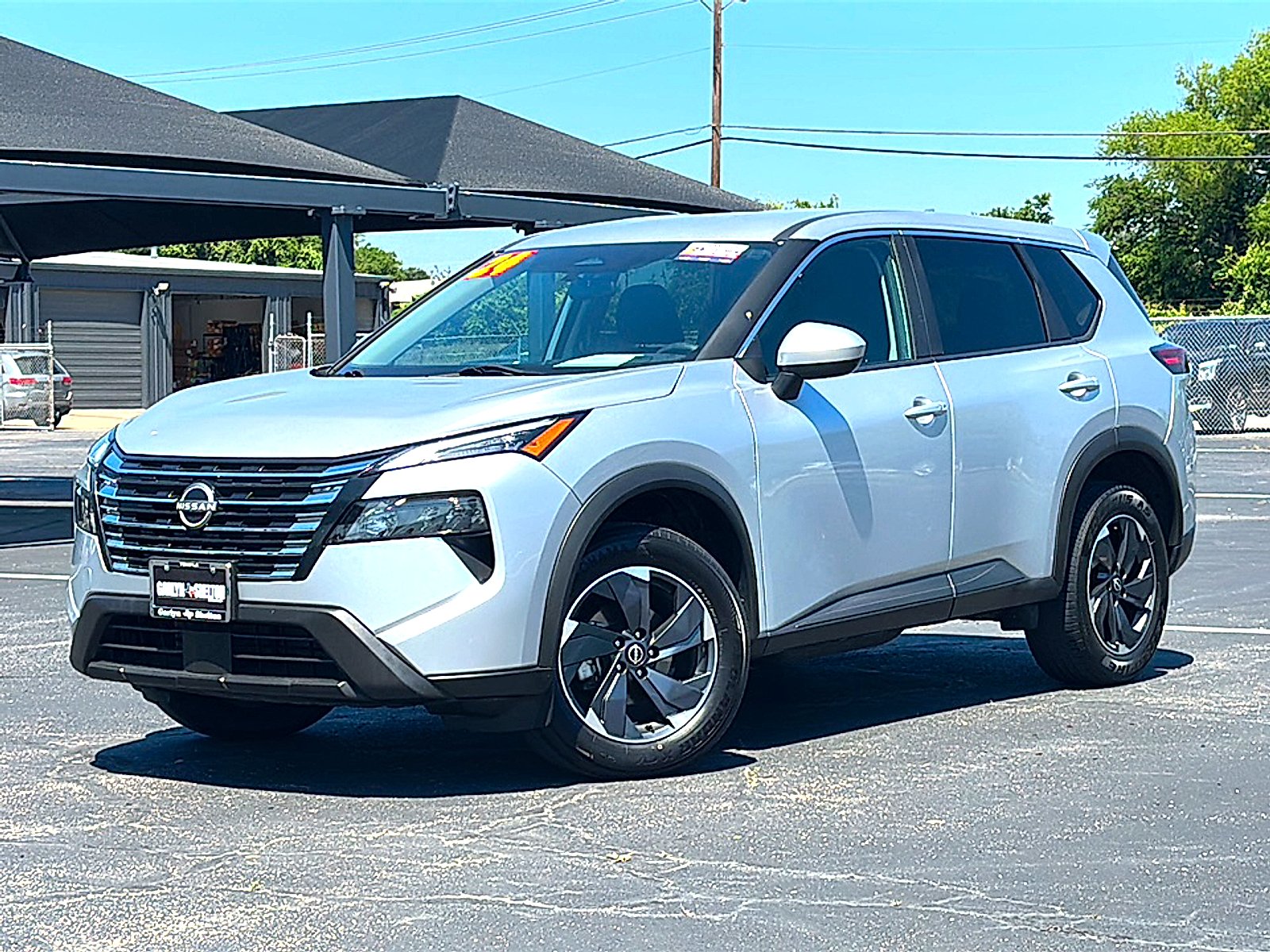 Used 2024 Brilliant Silver Metallic Nissan SV FWD image 2