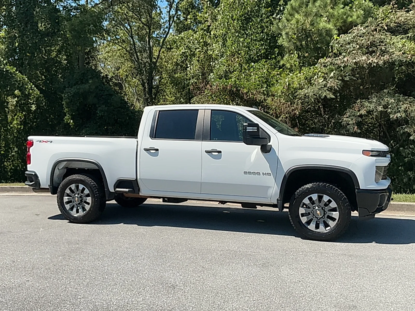 Used 2024 Summit White Chevrolet 4WD Crew Cab Standard Bed Custom image 1