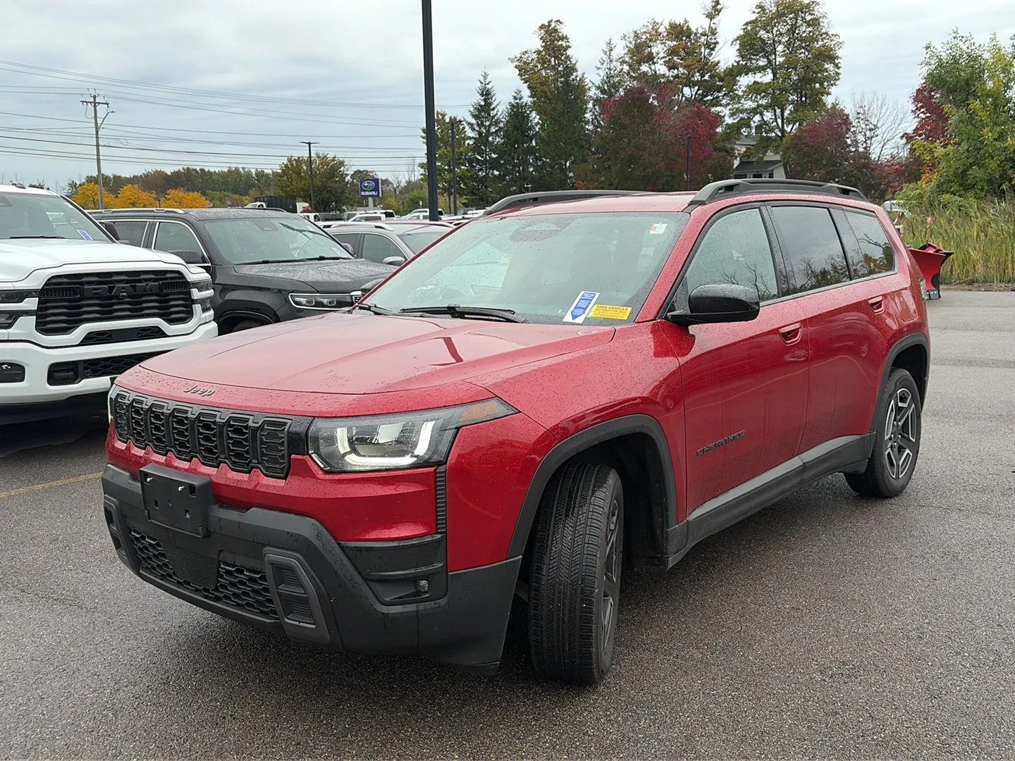 Used 2026 Red Hot Pearlcoat Jeep Laredo image 4
