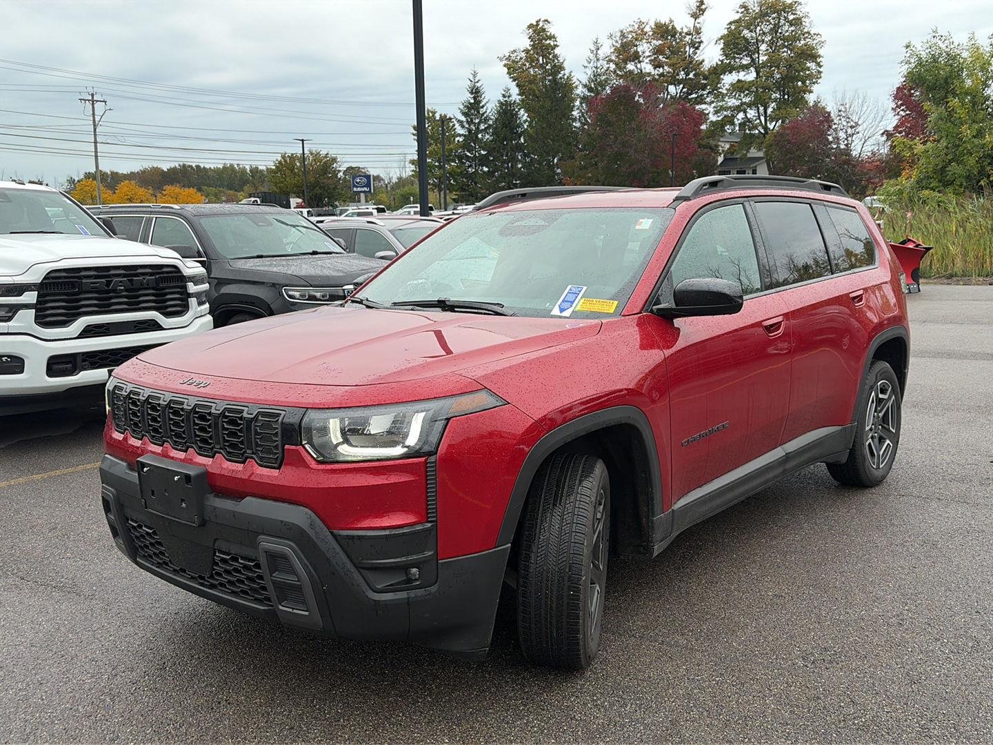 Used 2026 Red Hot Pearlcoat Jeep Laredo image 4