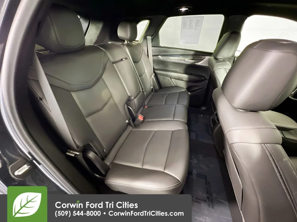 Used 2023 Stellar Black Metallic Cadillac Sport image 17