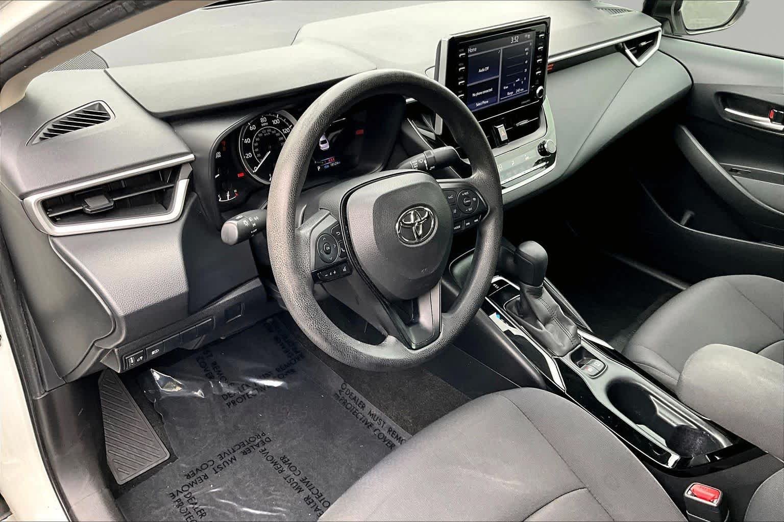 Used 2021 Super White Toyota LE image 18
