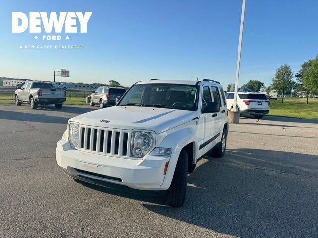 Used 2012 Bright White Jeep Sport image 4