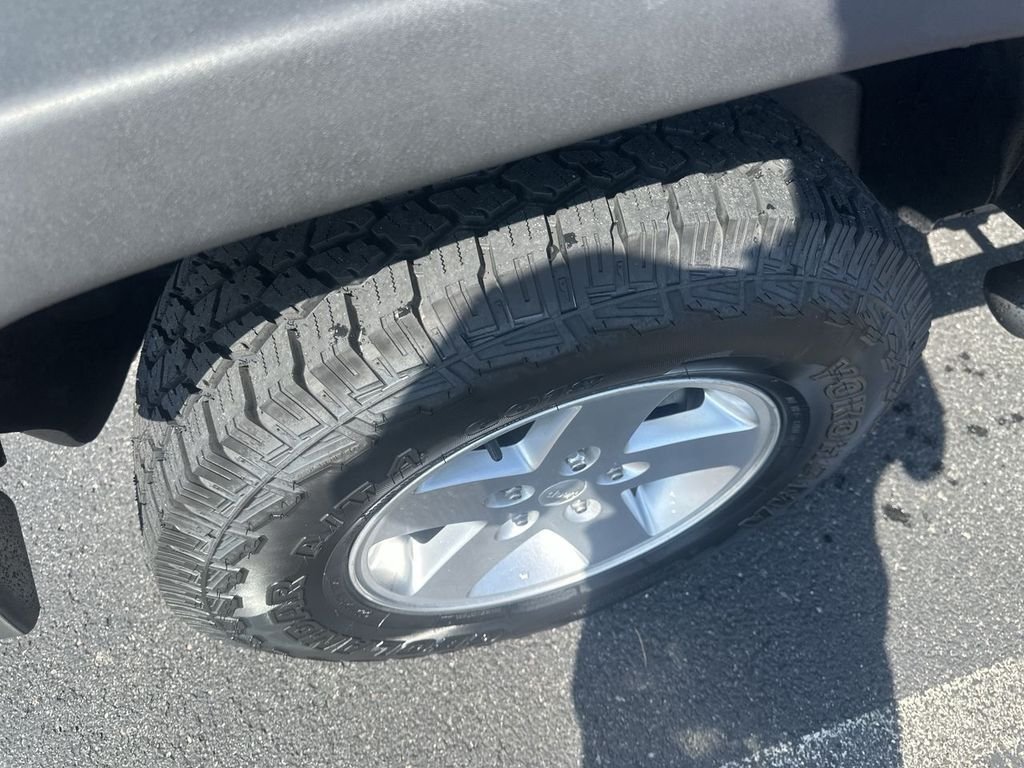 Used 2014 Black Jeep Unlimited Sport image 16