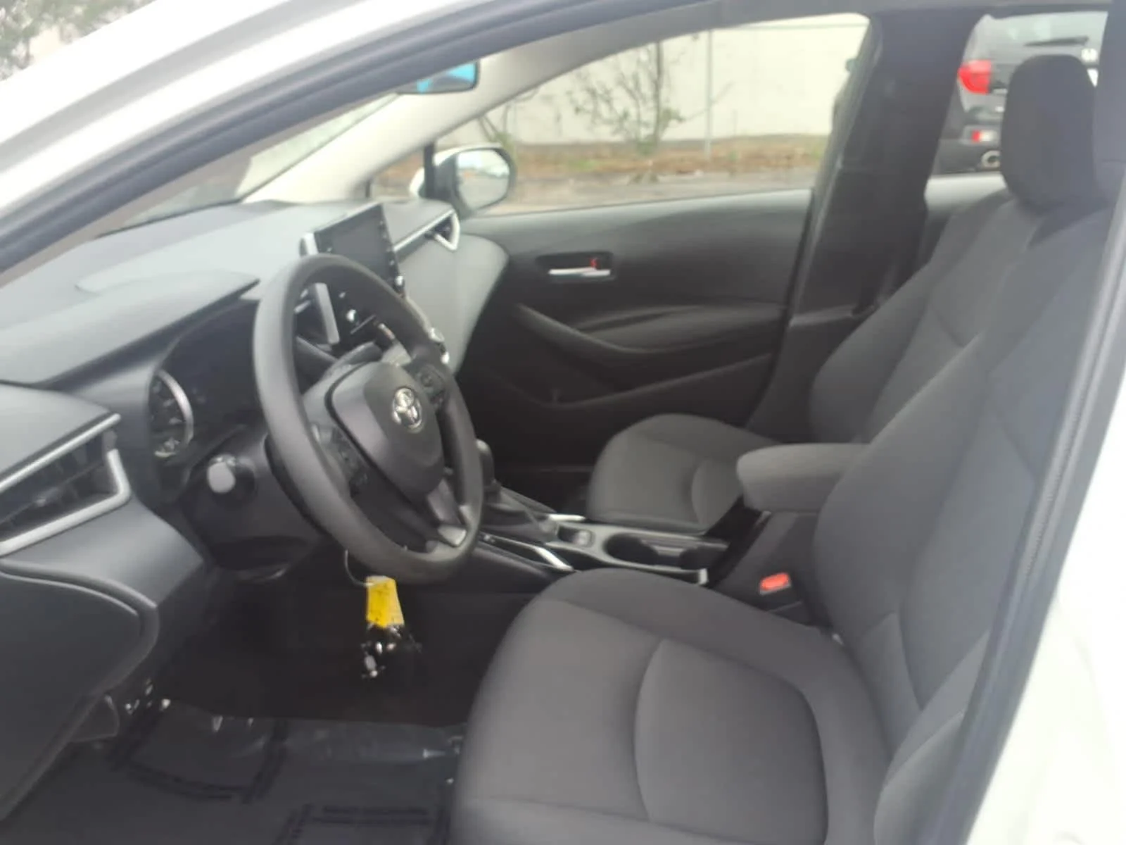 Used 2021 Super White Toyota LE image 17
