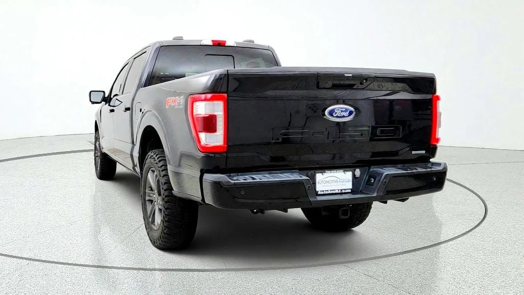 Used 2023 Agate Black Metallic Ford LARIAT 4WD SuperCrew 5.5