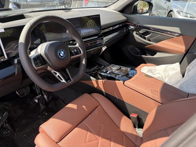 New 2026 Black Sapphire Metallic BMW 550e xDrive image 11