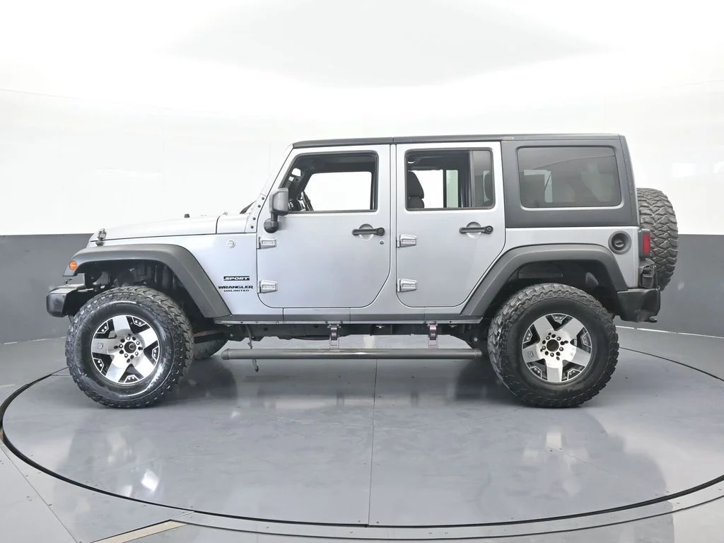 Used 2016 Billet Silver Metallic Clearcoat Jeep Unlimited Sport image 7