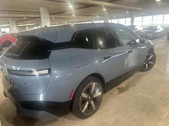 Used 2024 Storm Bay Metallic BMW xDrive50 image 5