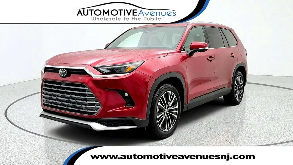 Used 2025 Ruby Flare Pearl Toyota Hybrid MAX Platinum AWD w/ Illuminated Cargo Sill image 1