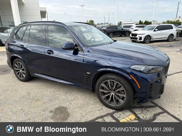 Used 2025 Blue BMW xDrive50e image 1