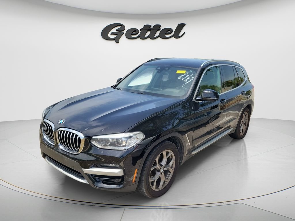 Used 2021 Black BMW xDrive30i image 1
