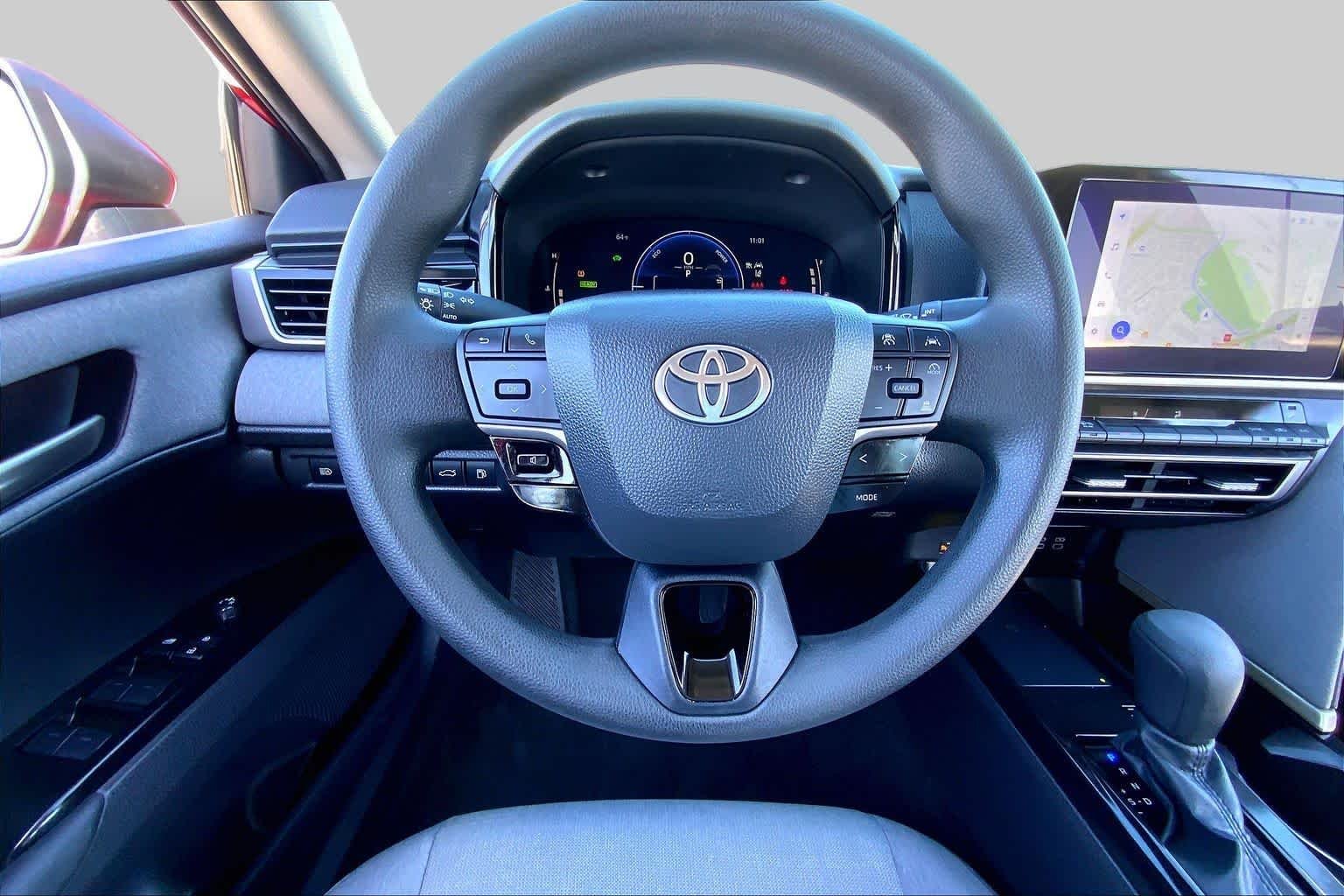 Used 2025 Supersonic Red Toyota LE image 6