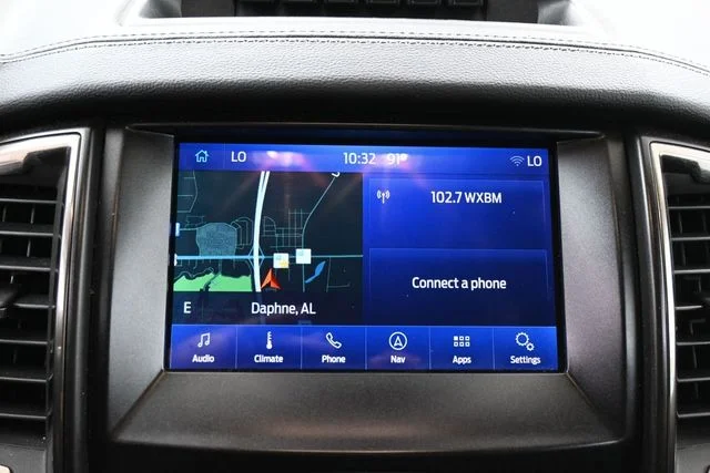 Used 2021 Orange Ford Lariat image 24