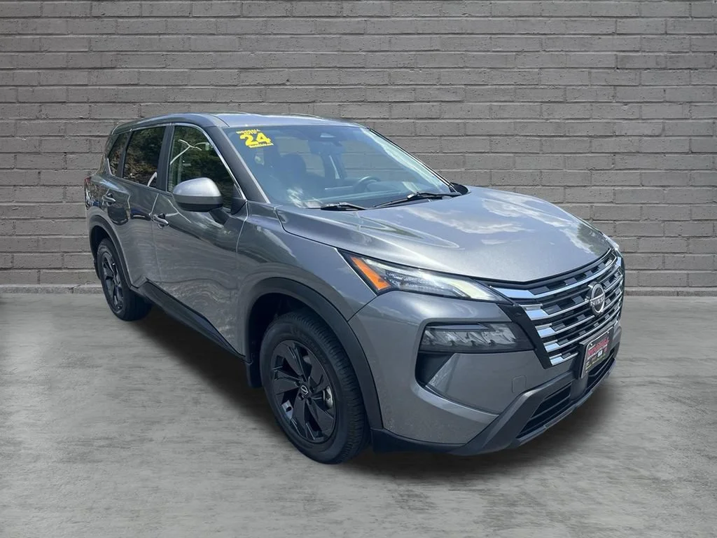 Used 2024 Gun Metallic Nissan SV image 1