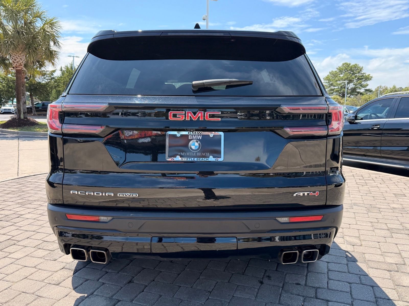 Used 2024 Ebony Twilight Metallic GMC AT4 image 9