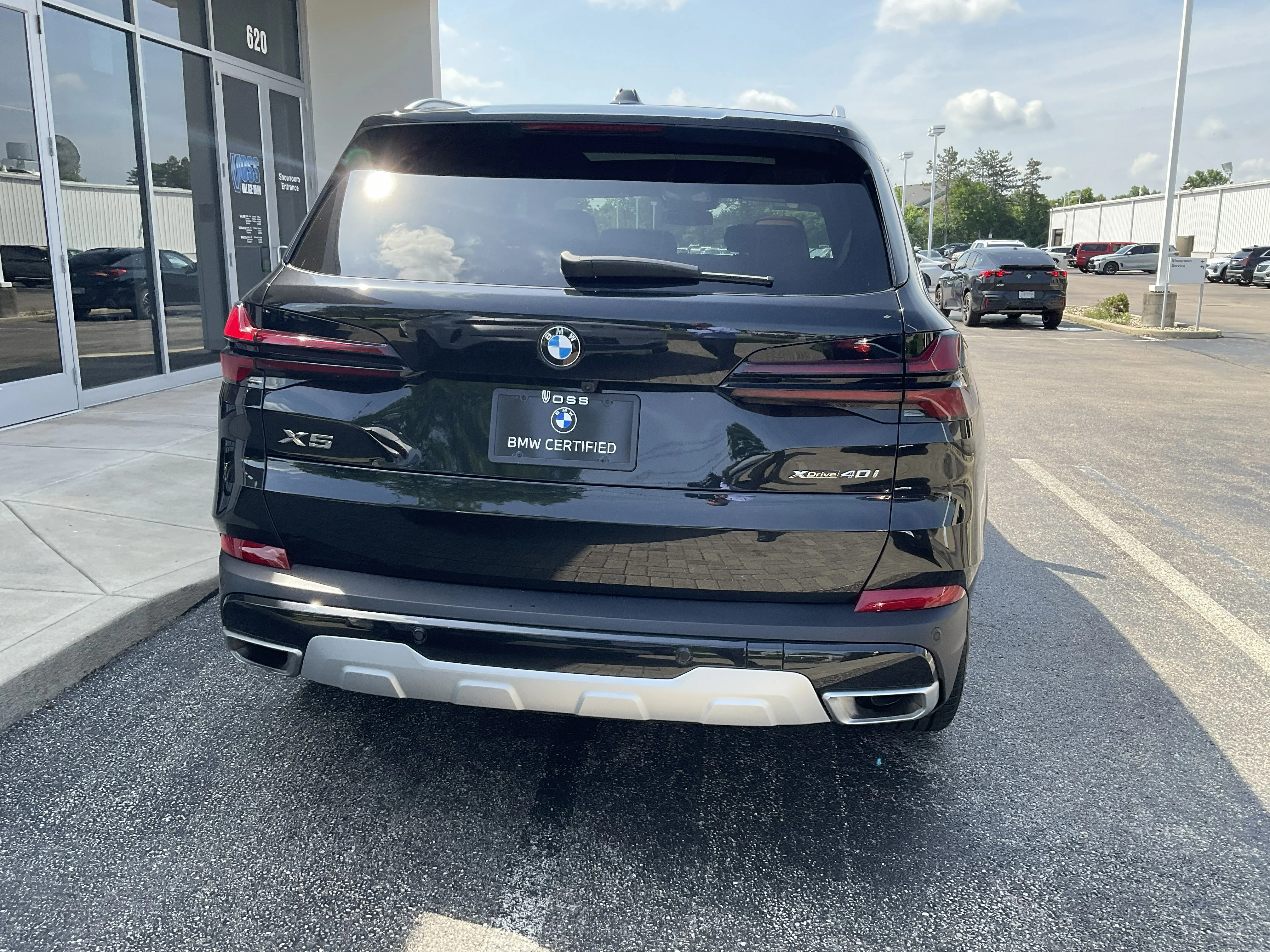 Certified Used 2024 Black Sapphire Metallic BMW xDrive40i image 6