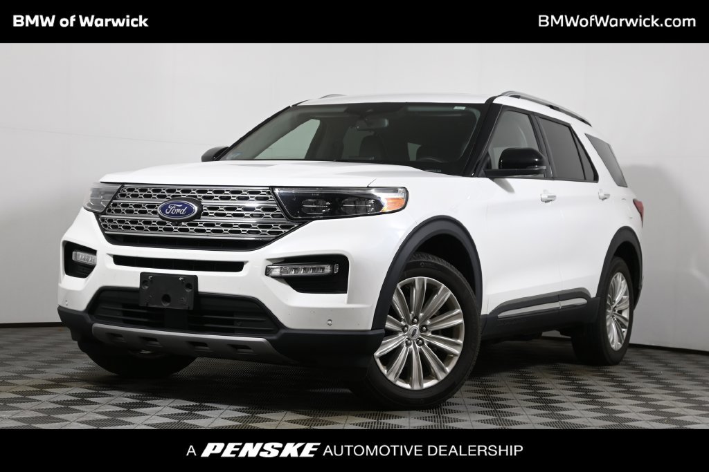 Used 2023 White Metallic Ford Limited image 1