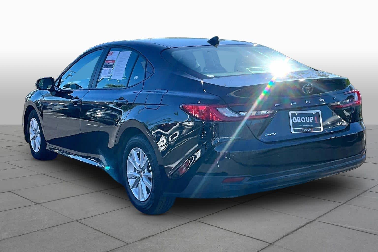 Used 2025 Midnight Black Metallic Toyota LE image 12