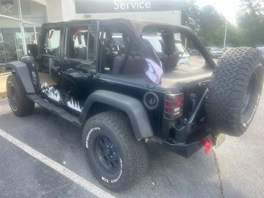 Used 2012 Black Jeep Sport image 4