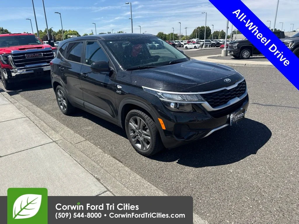 Used 2021 Cherry Black Kia LX image 1