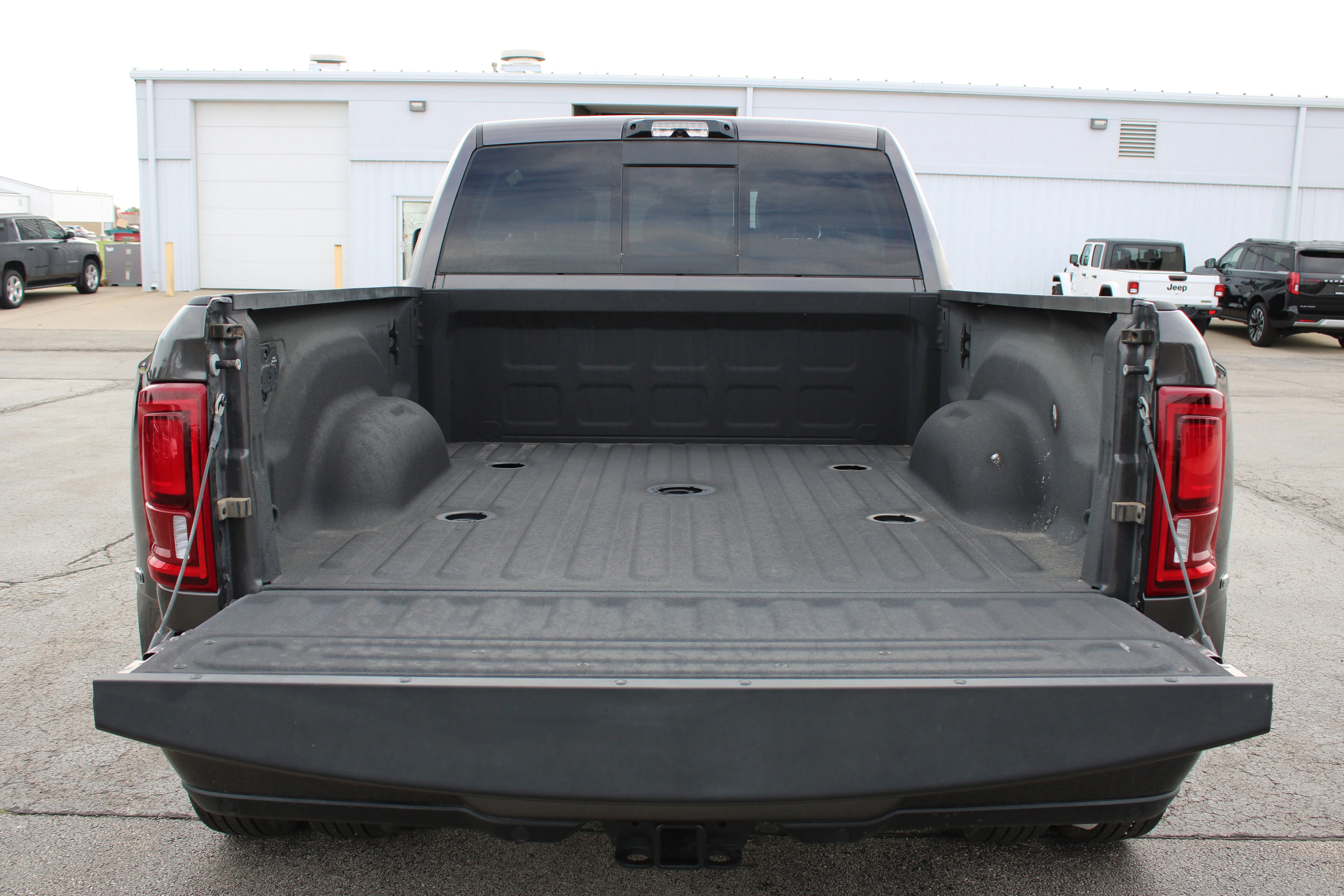 Used 2025 Granite Crystal Metallic Clearcoat Ram Laramie image 13