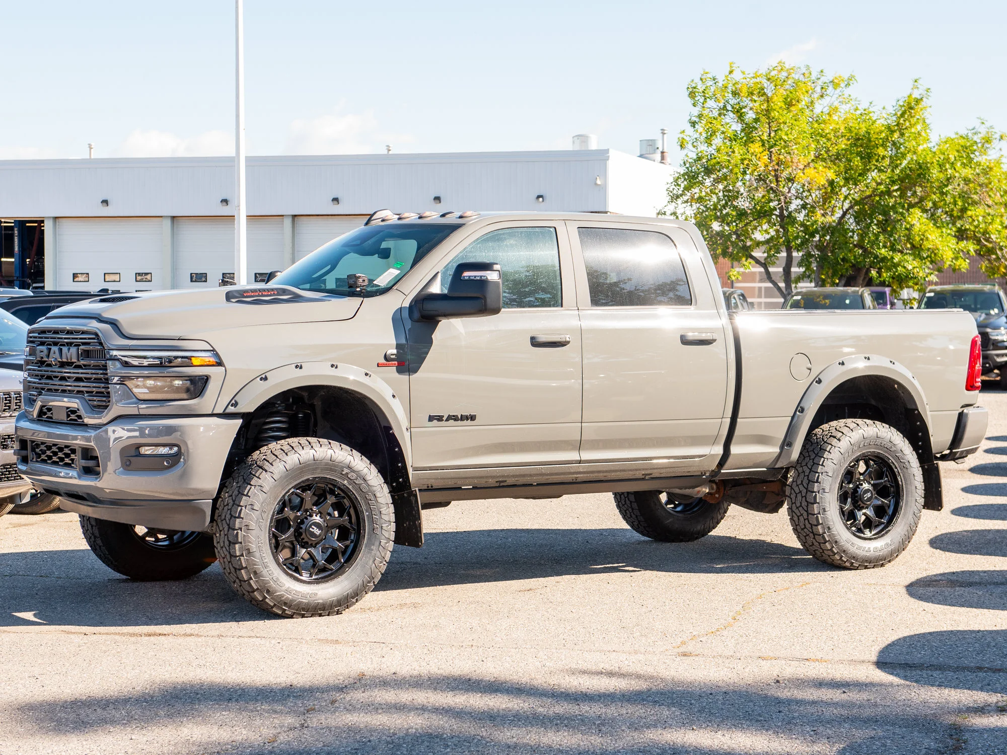 New 2026 Grey RAM Laramie Night* Crew Cab 4x4, 5 Inch Lift, 37 Inch Toyos, Rough Country Wheels, Pwr Running Boards image 4