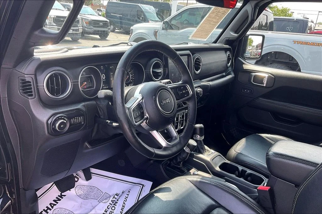 Used 2018 Black Jeep Unlimited Sahara image 12