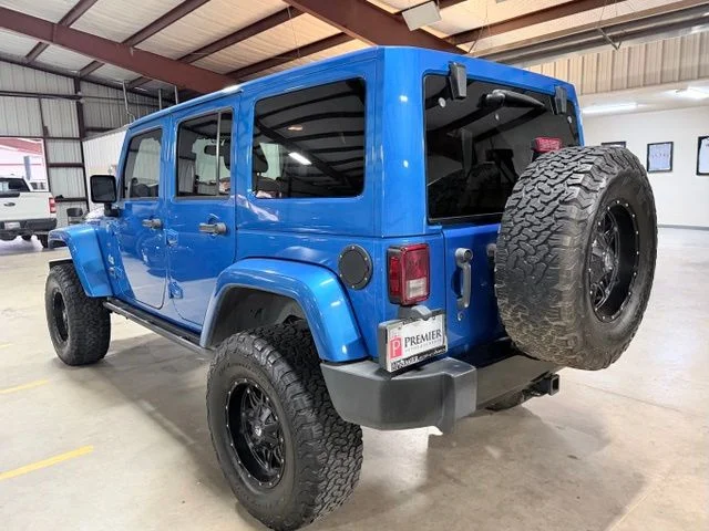 Used 2014 Blue Jeep Unlimited Sahara image 7