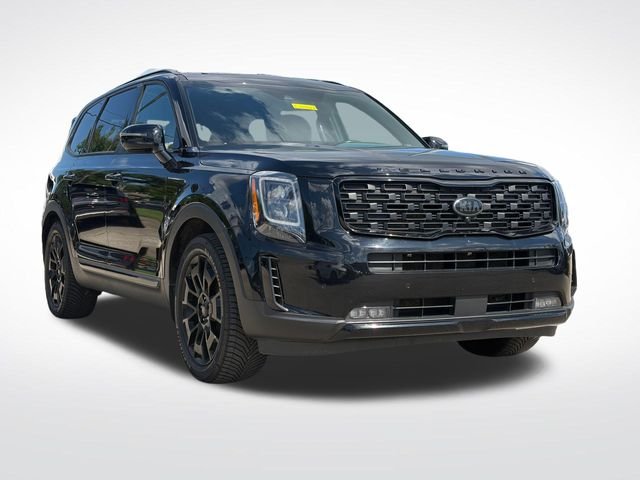 Used 2021 Ebony Black Kia SX image 1