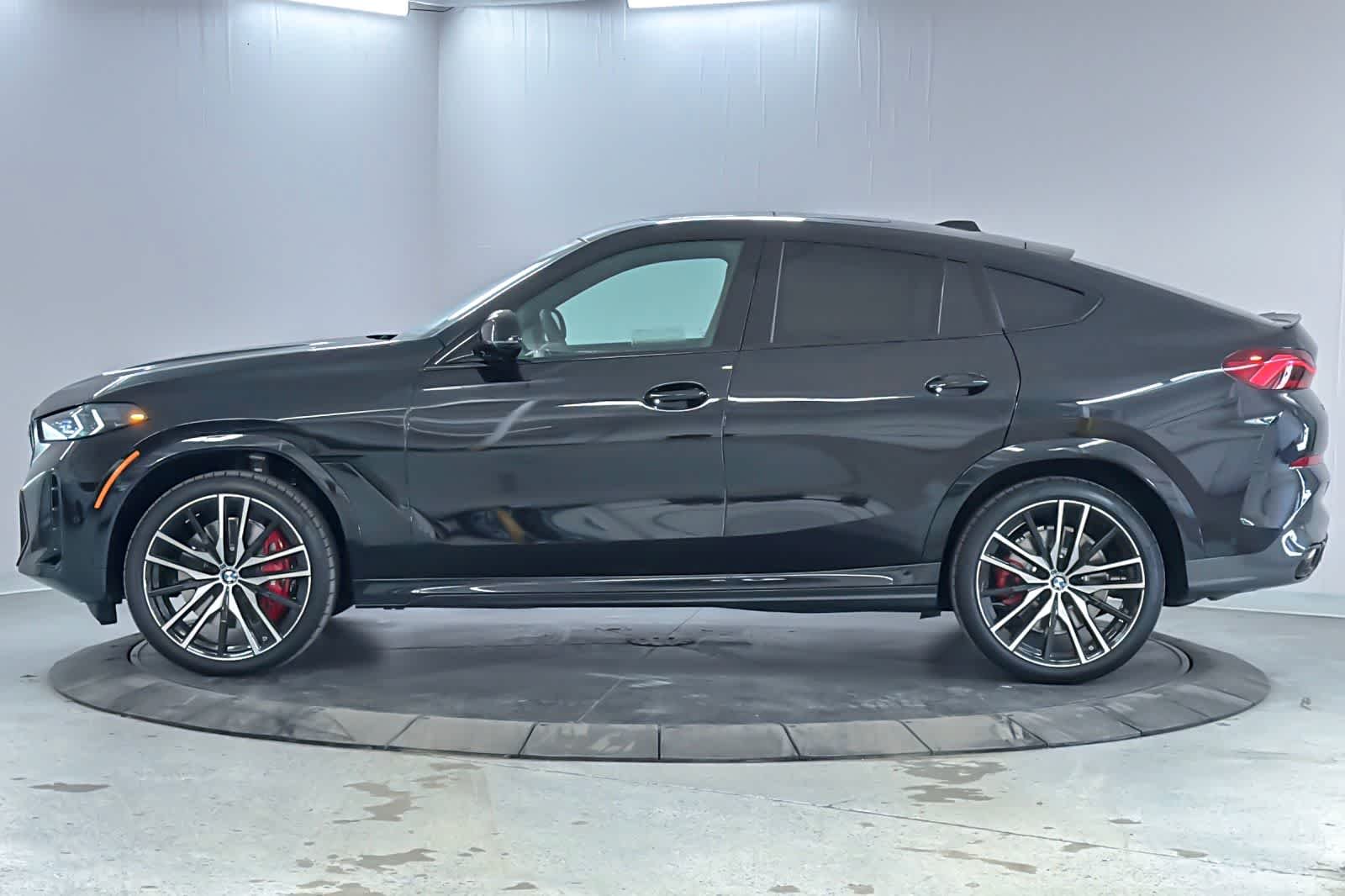 New 2026 Black Sapphire Metallic BMW M60i image 5